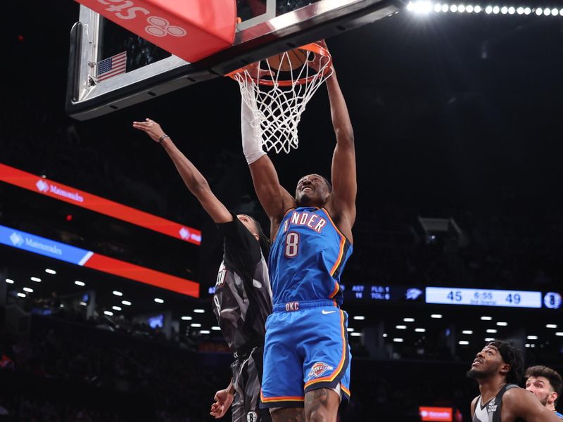 BROOKLYN, NY - FEBRUARY 26:  Jalen Williams #8 of the Oklahoma City Thunder dunks the ball during the game against the Brooklyn Nets on February 26, 2025 at Barclays Center in Brooklyn, New York. NOTE TO USER: User expressly acknowledges and agrees that, by downloading and or using this Photograph, user is consenting to the terms and conditions of the Getty Images License Agreement. Mandatory Copyright Notice: Copyright 2025 NBAE (Photo by Brandon Todd/NBAE via Getty Images)