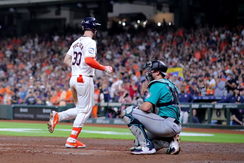 May 5, 2024; Houston, Texas, USA; Houston Astros right fielder Kyle Tucker (30) crosses home plate after hitting a two-run home run against the Seattle Mariners during the sixth inning at Minute Maid Park. Mandatory Credit: Erik Williams-USA TODAY Sports