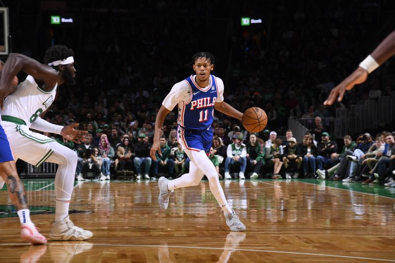 BOSTON, MA - OCTOBER 12: Jeff Dowtin Jr. #11 of the Philadelphia 76ers handles the ball during the game against the Boston Celtics during a NBA Preseason game on October 12, 2024 at TD Garden in Boston, Massachusetts. NOTE TO USER: User expressly acknowledges and agrees that, by downloading and/or using this Photograph, user is consenting to the terms and conditions of the Getty Images License Agreement. Mandatory Copyright Notice: Copyright 2024 NBAE (Photo by Brian Babineau/NBAE via Getty Images)