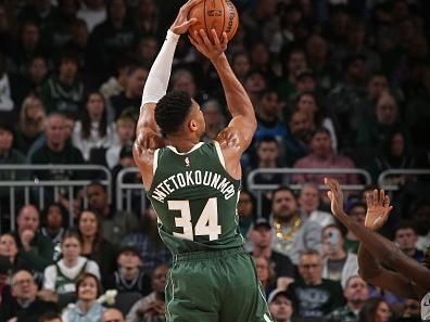 MILWAUKEE, WI - DECEMBER 21:  Giannis Antetokounmpo #34 of the Milwaukee Bucks shoots the ball during the game against the Orlando Magic on December 21, 2023 at the Fiserv Forum Center in Milwaukee, Wisconsin. NOTE TO USER: User expressly acknowledges and agrees that, by downloading and or using this Photograph, user is consenting to the terms and conditions of the Getty Images License Agreement. Mandatory Copyright Notice: Copyright 2023 NBAE (Photo by Gary Dineen/NBAE via Getty Images).