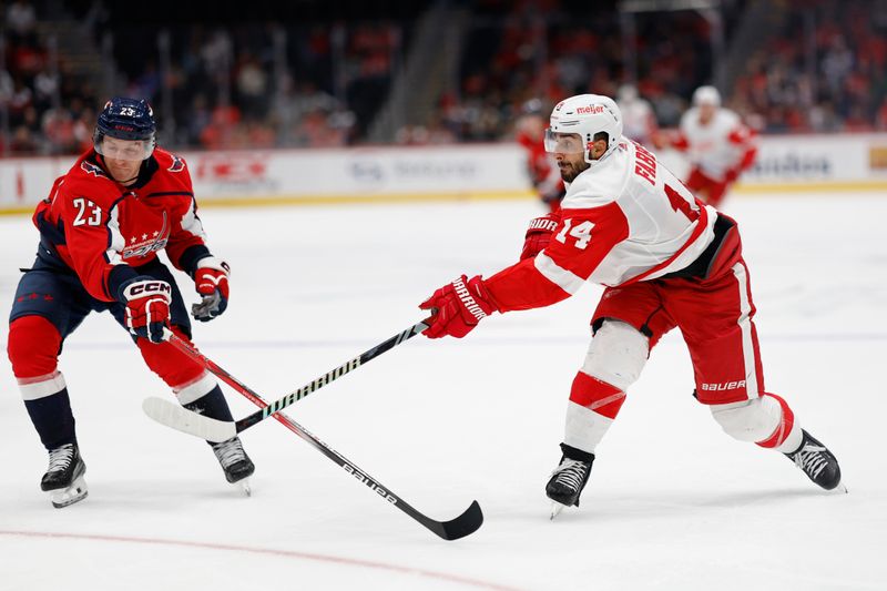 Sep 28, 2023; Washington, District of Columbia, USA; Detroit Red Wings center Robby Fabbri (14) shoots the puck as Washington Capitals center Michael Sgarbossa (23) defends in the third period at Capital One Arena. Mandatory Credit: Geoff Burke-USA TODAY Sports