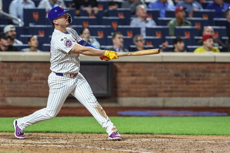 Sep 3, 2024; New York City, New York, USA;  New York Mets first baseman Pete Alonso (20) hits a two-run home run in the eighth inning against the Boston Red Sox at Citi Field. Mandatory Credit: Wendell Cruz-Imagn Images