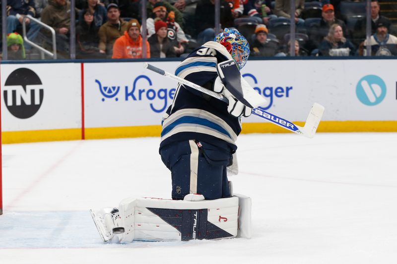 Jan 28, 2026; Columbus, Ohio, USA; Columbus Blue Jackets goalie Elvis Merzlikins (90) makes a save against the Philadelphia Flyers  during the third period at Nationwide Arena. Mandatory Credit: Russell LaBounty-Imagn Images