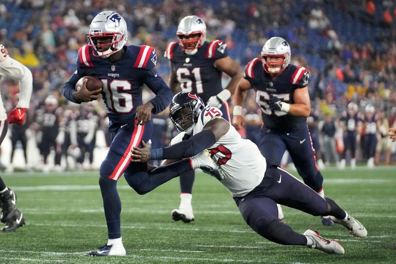 New England Patriots quarterback Malik Cunningham (16) runs with the ball as Houston Texans defensive end Adedayo Odeleye (75) reaches for him during the second half of an NFL preseason football game, Thursday, Aug. 10, 2023, in Foxborough, Mass. (AP Photo/Steven Senne)