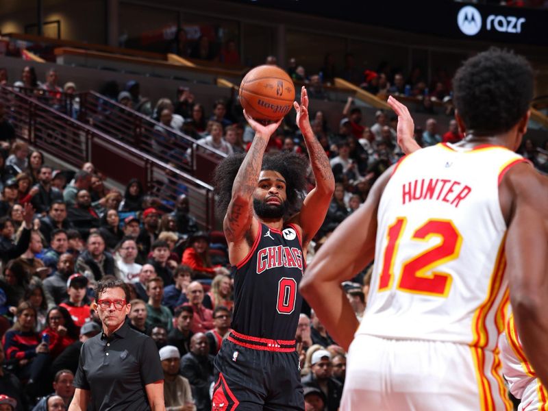 CHICAGO, IL - NOVEMBER 22: Coby White #0 of the Chicago Bulls three point basket during the game against the Atlanta Hawks during the Emirates NBA Cup game on November 22, 2024 at United Center in Chicago, Illinois. NOTE TO USER: User expressly acknowledges and agrees that, by downloading and or using this photograph, User is consenting to the terms and conditions of the Getty Images License Agreement. Mandatory Copyright Notice: Copyright 2024 NBAE (Photo by Jeff Haynes/NBAE via Getty Images)