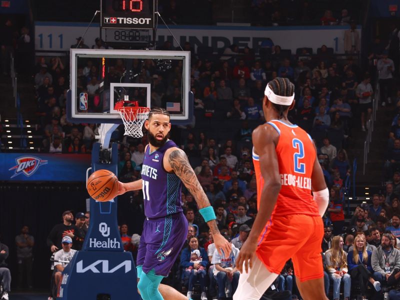 OKLAHOMA CITY, OK - FEBUARY 2:  Cody Martin #11 of the Charlotte Hornets handles the ball during the game  on February 2, 2024 at Paycom Arena in Oklahoma City, Oklahoma. NOTE TO USER: User expressly acknowledges and agrees that, by downloading and or using this photograph, User is consenting to the terms and conditions of the Getty Images License Agreement. Mandatory Copyright Notice: Copyright 2024 NBAE (Photo by Zach Beeker/NBAE via Getty Images)