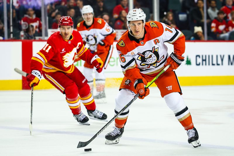 Jan 30, 2025; Calgary, Alberta, CAN; Anaheim Ducks center Ryan Strome (16) controls the puck against the Calgary Flames during the third period at Scotiabank Saddledome. Mandatory Credit: Sergei Belski-Imagn Images