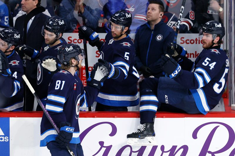 Mar 11, 2024; Winnipeg, Manitoba, CAN; Winnipeg Jets left wing Kyle Connor (81) celebrates his third period goal against the Washington Capitals at Canada Life Centre. Mandatory Credit: James Carey Lauder-USA TODAY Sports