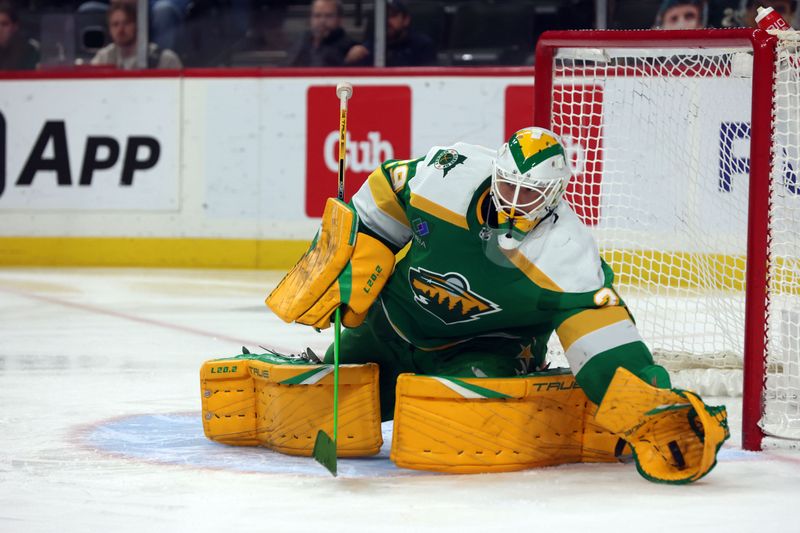 Apr 6, 2024; Saint Paul, Minnesota, USA; Minnesota Wild goaltender Marc-Andre Fleury (29) makes a save against the Winnipeg Jets during the third period at Xcel Energy Center. Winnipeg won 4-2. Mandatory Credit: Bruce Fedyck-USA TODAY Sports