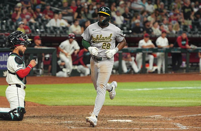 Jun 28, 2024; Phoenix, Arizona, USA; Oakland Athletics outfielder Daz Cameron (28) reacts after hitting a home run in the eighth inning against Arizona Diamondbacks at Chase Field. Mandatory Credit: Allan Henry-USA TODAY Sports