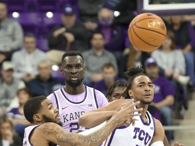 Jan 14, 2023; Fort Worth, Texas, USA;  Kansas State Wildcats center Abayomi Iyiola (23) and TCU Horned Frogs forward Chuck O'Bannon Jr. (5) go for the ball during the first half at Ed and Rae Schollmaier Arena. Mandatory Credit: Kevin Jairaj-USA TODAY Sports