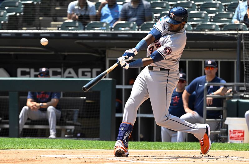 Jun 20, 2024; Chicago, Illinois, USA;  Houston Astros outfielder Yordan Alvarez (44) hits a home run against the Chicago White Sox during the first inning at Guaranteed Rate Field. Mandatory Credit: Matt Marton-USA TODAY Sports