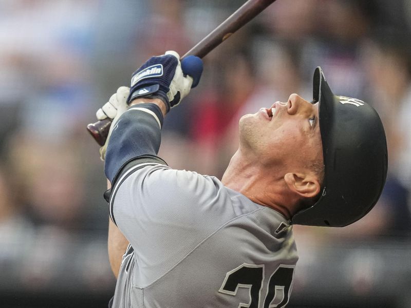 Aug 15, 2023; Cumberland, Georgia, USA; New York Yankees catcher Ben Rortvedt (38) watches the flight of a ball he hit against the Atlanta Braves during the sixth inning at Truist Park. Mandatory Credit: Dale Zanine-USA TODAY Sports