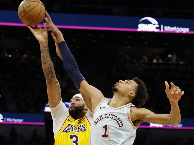 SAN ANTONIO, TEXAS - NOVEMBER 27: Victor Wembanyama #1 of the San Antonio Spurs blocks the shot of Anthony Davis #3 of the Los Angeles Lakers during the fourth quarter at Frost Bank Center on November 27, 2024 in San Antonio, Texas. NOTE TO USER: User expressly acknowledges and agrees that, by downloading and or using this photograph, User is consenting to the terms and conditions of the Getty Images License Agreement (Photo by Ronald Cortes/Getty Images)