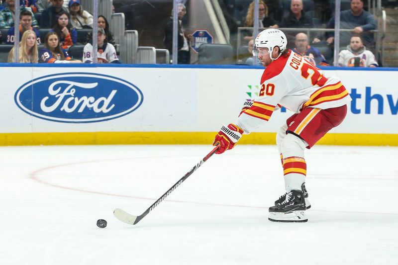 Feb 10, 2024; Elmont, New York, USA;  Calgary Flames center Blake Coleman (20) controls the puck in the third period New York Islanders at UBS Arena. Mandatory Credit: Wendell Cruz-USA TODAY Sports