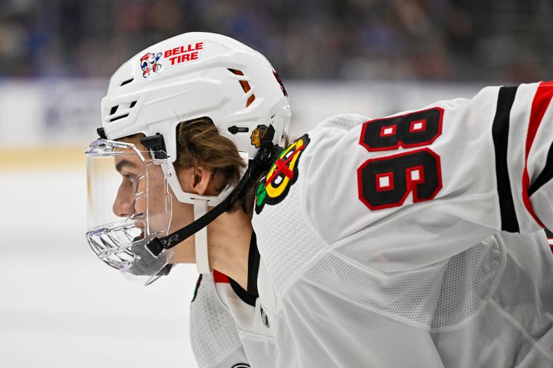 Apr 10, 2024; St. Louis, Missouri, USA;  Chicago Blackhawks center Connor Bedard (98) waits for a face off against the St. Louis Blues during the first period at Enterprise Center. Mandatory Credit: Jeff Curry-USA TODAY Sports