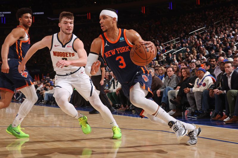 NEW YORK, NY - JANUARY 25: Josh Hart #3 of the New York Knicks handles the ball during the game against the Denver Nuggets on January 25, 2024 at Madison Square Garden in New York City, New York.  NOTE TO USER: User expressly acknowledges and agrees that, by downloading and or using this photograph, User is consenting to the terms and conditions of the Getty Images License Agreement. Mandatory Copyright Notice: Copyright 2024 NBAE  (Photo by Nathaniel S. Butler/NBAE via Getty Images)