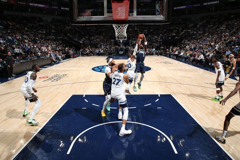 MINNEAPOLIS, MN -  OCTOBER 29: Kyrie Irving #11 of the Dallas Mavericks shoots the ball during the game against the Minnesota Timberwolves on October 29, 2024 at Target Center in Minneapolis, Minnesota. NOTE TO USER: User expressly acknowledges and agrees that, by downloading and or using this Photograph, user is consenting to the terms and conditions of the Getty Images License Agreement. Mandatory Copyright Notice: Copyright 2024 NBAE (Photo by David Sherman/NBAE via Getty Images)