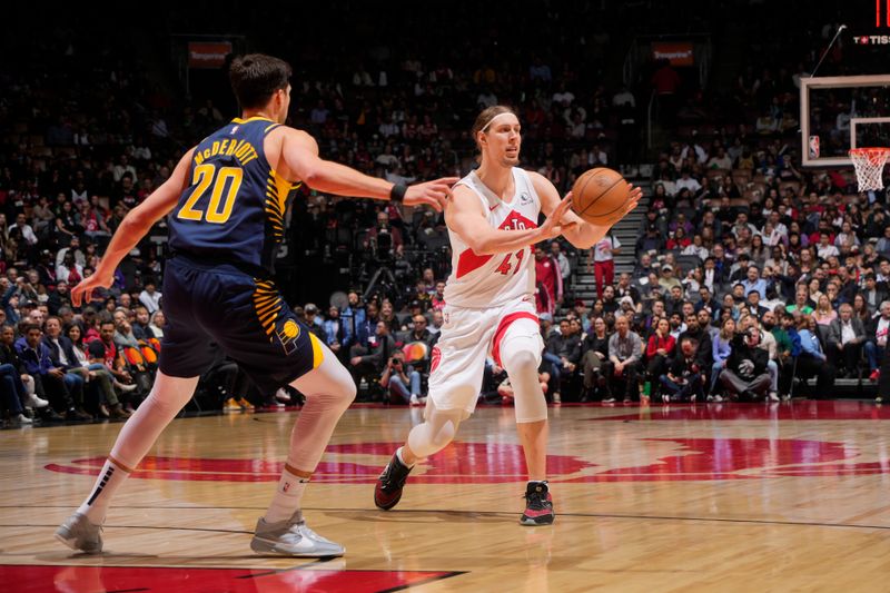 TORONTO, CANADA - APRIL 9: Kelly Olynyk #41 of the Toronto Raptor looks to pass the ball during the game against the Indiana Pacers on April 9, 2024 at the Scotiabank Arena in Toronto, Ontario, Canada.  NOTE TO USER: User expressly acknowledges and agrees that, by downloading and or using this Photograph, user is consenting to the terms and conditions of the Getty Images License Agreement.  Mandatory Copyright Notice: Copyright 2024 NBAE (Photo by Mark Blinch/NBAE via Getty Images)