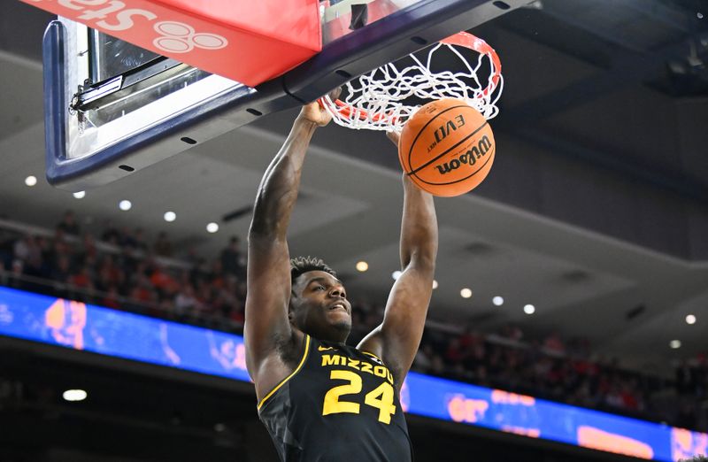 Feb 14, 2023; Auburn, Alabama, USA;  Missouri Tigers guard Kobe Brown (24) dunks the ball against the Auburn Tigers during the first half at Neville Arena. Mandatory Credit: Julie Bennett-USA TODAY Sports