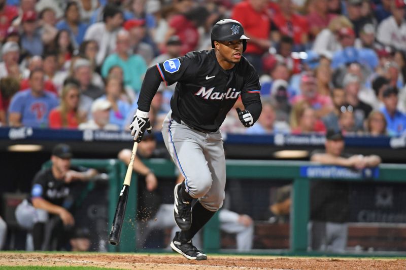 Aug 13, 2024; Philadelphia, Pennsylvania, USA; Miami Marlins shortstop Xavier Edwards (63) hits single during the seventh inning against the Philadelphia Phillies at Citizens Bank Park. Mandatory Credit: Eric Hartline-USA TODAY Sports