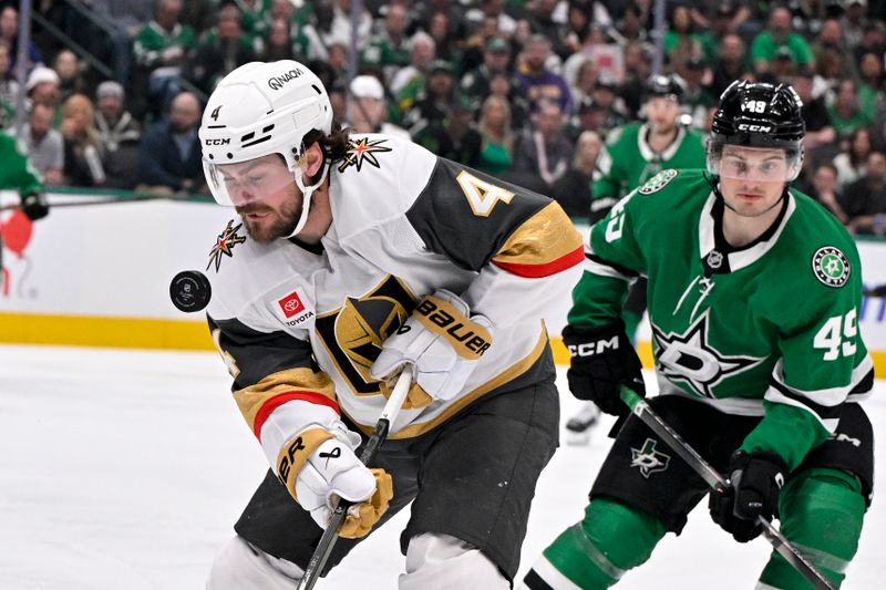 Mar 10, 2026; Dallas, Texas, USA; Vegas Golden Knights defenseman Rasmus Andersson (4) tracks the puck in the air and Dallas Stars center Justin Hryckowian (49) chases during the third period at the American Airlines Center. Mandatory Credit: Jerome Miron-Imagn Images