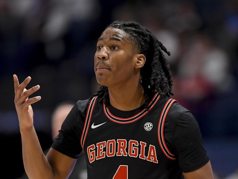 Mar 14, 2024; Nashville, TN, USA;  Georgia Bulldogs guard Silas Demary Jr. (4) calls out the play against the Florida Gators during the first half at Bridgestone Arena. Mandatory Credit: Steve Roberts-USA TODAY Sports