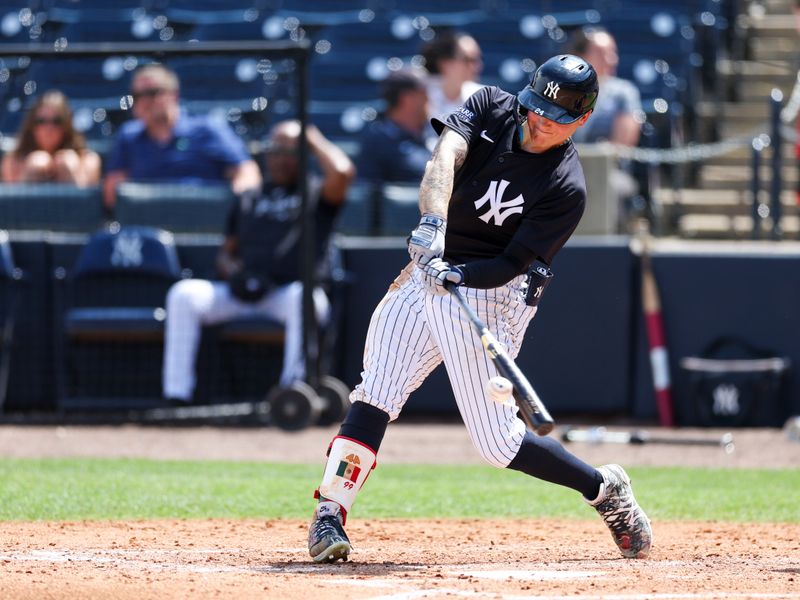 Mar 18, 2024; Tampa, Florida, USA;  New York Yankees right fielder Alex Verdugo (24) hits a base hit against the Philadelphia Phillies in the sixth inning at George M. Steinbrenner Field. Mandatory Credit: Nathan Ray Seebeck-USA TODAY Sports