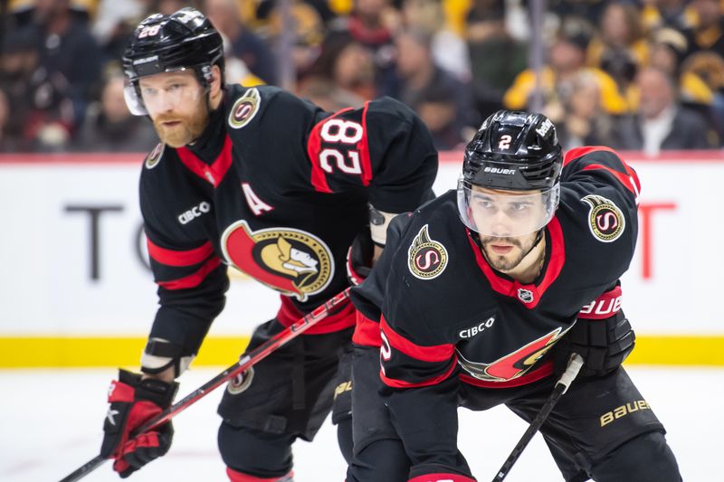 Jan 18, 2025; Ottawa, Ontario, CAN; Ottawa Senators right wing Claude Giroux (28) and defenseman Atem Zub (2) get in position for a face-off in the second period against the Boston Bruins at the Canadian Tire Centre. Mandatory Credit: Marc DesRosiers-Imagn Images