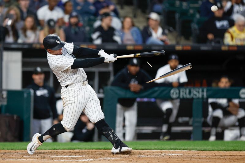 May 27, 2024; Chicago, Illinois, USA; Chicago White Sox first baseman Andrew Vaughn (25) breaks his bat against the Toronto Blue Jays during the sixth inning at Guaranteed Rate Field. Mandatory Credit: Kamil Krzaczynski-USA TODAY Sports