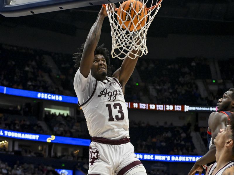 Mar 14, 2024; Nashville, TN, USA;  Texas A&M Aggies forward Solomon Washington (13) slams the ball during the second half at Bridgestone Arena. Mandatory Credit: Steve Roberts-USA TODAY Sports