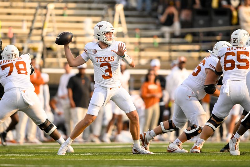 Oct 26, 2024; Nashville, Tennessee, USA;  Texas Longhorns quarterback Quinn Ewers (3) drops back to throw against the Vanderbilt Commodores during the first half at FirstBank Stadium. Mandatory Credit: Steve Roberts-Imagn Images