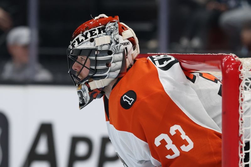 Jan 21, 2026; Salt Lake City, Utah, USA; Philadelphia Flyers goaltender Samuel Ersson (33) tends the net against the Utah Mammoth during the first period at Delta Center. Mandatory Credit: Rob Gray-Imagn Images