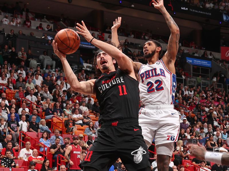 MIAMI, FL - APRIL 4: Jaime Jaquez Jr. #11 of the Miami Heat drives to the basket during the game against the Philadelphia 76ers on April 4, 2024 at Kaseya Center in Miami, Florida. NOTE TO USER: User expressly acknowledges and agrees that, by downloading and or using this Photograph, user is consenting to the terms and conditions of the Getty Images License Agreement. Mandatory Copyright Notice: Copyright 2024 NBAE (Photo by Issac Baldizon/NBAE via Getty Images)