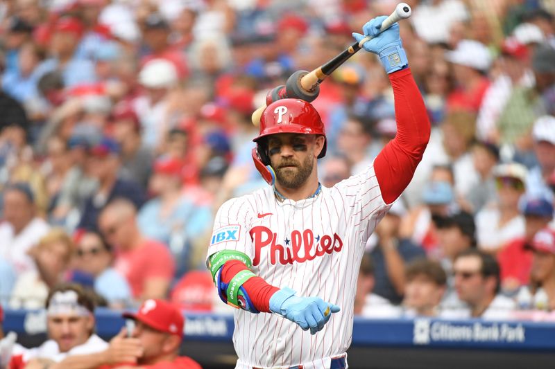 Jun 30, 2025; Philadelphia, Pennsylvania, USA; Philadelphia Phillies first base Bryce Harper (3) on deck during the first inning against the San Diego Padres at Citizens Bank Park. Mandatory Credit: Eric Hartline-Imagn Images