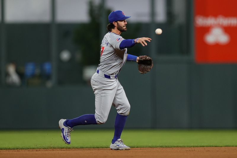 Sep 13, 2024; Denver, Colorado, USA; Chicago Cubs shortstop Dansby Swanson (7) throws to first for an out in the fourth inning against the Colorado Rockies at Coors Field. Mandatory Credit: Isaiah J. Downing-Imagn Images