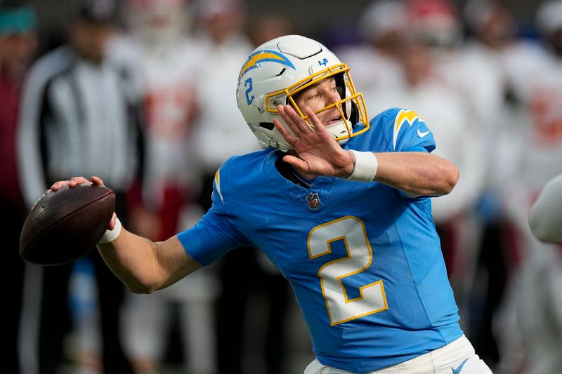 Los Angeles Chargers quarterback Easton Stick throws a pass during the first half of an NFL football game against the Kansas City Chiefs, Sunday, Jan. 7, 2024, in Inglewood, Calif. (AP Photo/Mark J. Terrill)