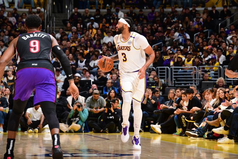 LOS ANGELES, CA - NOVEMBER 10: Anthony Davis #3 of the Los Angeles Lakers dribbles the ball during the game against the Toronto Raptors on November 10, 2024 at Crypto.Com Arena in Los Angeles, California. NOTE TO USER: User expressly acknowledges and agrees that, by downloading and/or using this Photograph, user is consenting to the terms and conditions of the Getty Images License Agreement. Mandatory Copyright Notice: Copyright 2024 NBAE (Photo by Adam Pantozzi/NBAE via Getty Images)