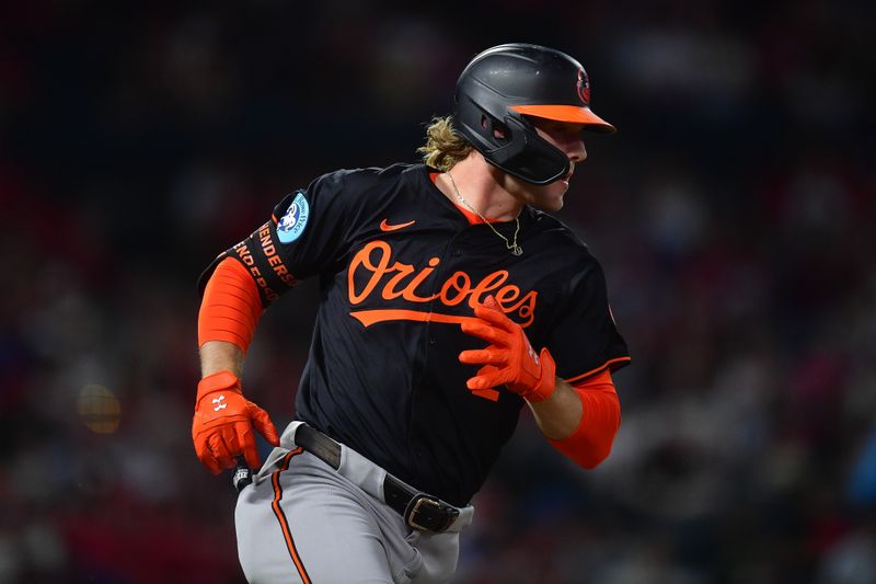 May 10, 2025; Anaheim, California, USA; Baltimore Orioles designated hitter Gunnar Henderson (2) hits a single against the Los Angeles Angels during the sixth inning at Angel Stadium. Mandatory Credit: Gary A. Vasquez-Imagn Images