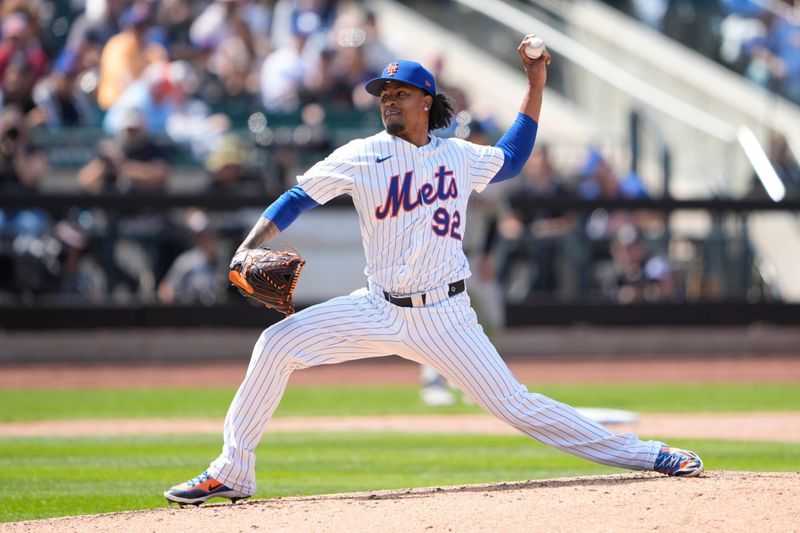 May 1, 2025; New York City, New York, USA; New York Mets pitcher Genesis Cabrera (92)  delivers a pitch against the Arizona Diamondbacks during the fifth inning at Citi Field. Mandatory Credit: Gregory Fisher-Imagn Images