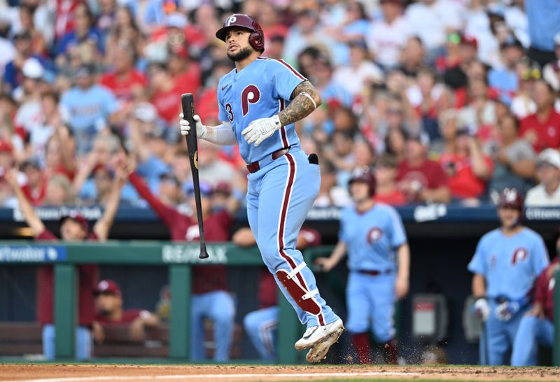 Jun 27, 2024; Philadelphia, Pennsylvania, USA; Philadelphia Phillies catcher Rafael Marchan (13) reacts after hitting a home run against the Miami Marlins in the fourth inning at Citizens Bank Park. Mandatory Credit: Kyle Ross-USA TODAY Sports