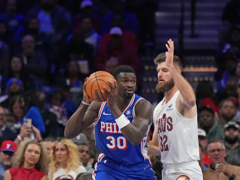 PHILADELPHIA, PA - NOVEMBER 13: Adem Bona #30 of the Philadelphia 76ers handles the ball during the game against the Cleveland Cavaliers on November 13, 2024 at the Wells Fargo Center in Philadelphia, Pennsylvania NOTE TO USER: User expressly acknowledges and agrees that, by downloading and/or using this Photograph, user is consenting to the terms and conditions of the Getty Images License Agreement. Mandatory Copyright Notice: Copyright 2024 NBAE (Photo by Jesse D. Garrabrant/NBAE via Getty Images)