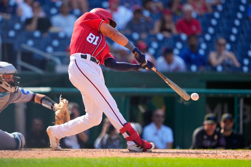 Sep 3, 2023; Washington, District of Columbia, USA;  Washington Nationals catcher Drew Millas (81) hits a single against the Miami Marlins during the seventh inning at Nationals Park. Mandatory Credit: Gregory Fisher-USA TODAY Sports