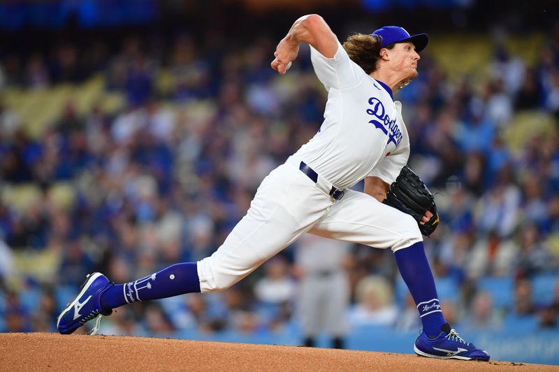 Apr 3, 2024; Los Angeles, California, USA; Los Angeles Dodgers starting pitcher Tyler Glasnow (31) throws against the San Francisco Giants during the first inning at Dodger Stadium. Mandatory Credit: Gary A. Vasquez-USA TODAY Sports