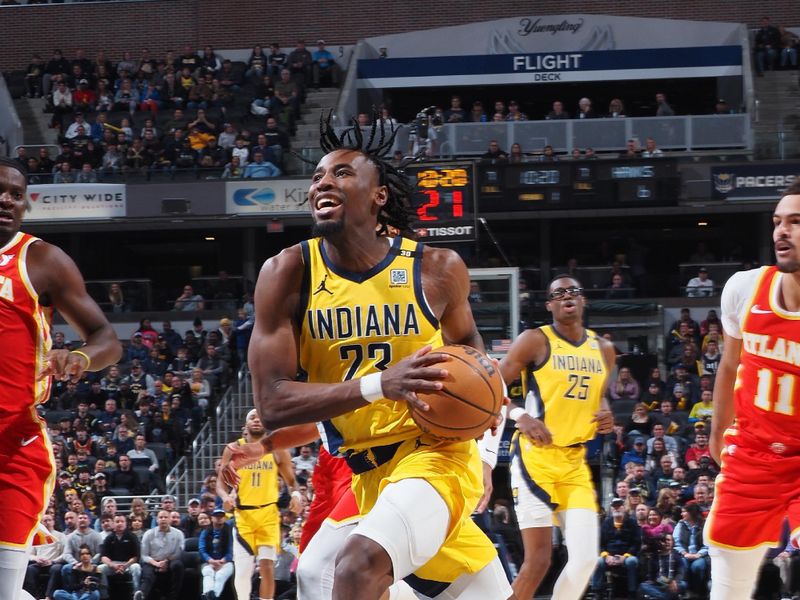 INDIANAPOLIS, IN - JANUARY 5: Aaron Nesmith #23 of the Indiana Pacers drives to the basket during the game against the Atlanta Hawks on January 5, 2024 at Gainbridge Fieldhouse in Indianapolis, Indiana. NOTE TO USER: User expressly acknowledges and agrees that, by downloading and or using this Photograph, user is consenting to the terms and conditions of the Getty Images License Agreement. Mandatory Copyright Notice: Copyright 2024 NBAE (Photo by Ron Hoskins/NBAE via Getty Images)