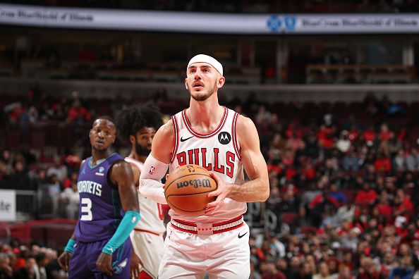 CHICAGO, IL - DECEMBER 6: Alex Caruso #6 of the Chicago Bulls shoots a free throw during the game against the Charlotte Hornets on December 6, 2023 at the United Center in Chicago, Illinois. NOTE TO USER: User expressly acknowledges and agrees that, by downloading and or using this Photograph, user is consenting to the terms and conditions of the Getty Images License Agreement. Mandatory Copyright Notice: Copyright 2023 NBAE (Photo by Gary Dineen/NBAE via Getty Images).