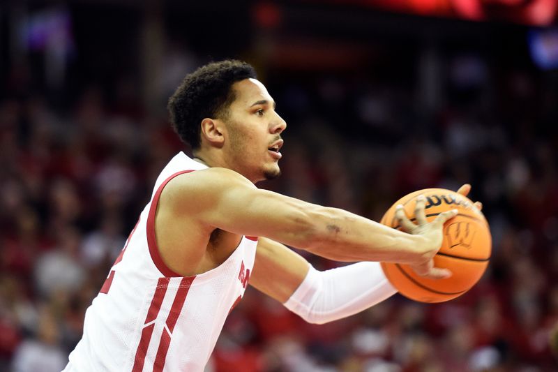 Jan 3, 2023; Madison, Wisconsin, USA;  Wisconsin Badgers guard Jordan Davis (2) passes the ball against the Minnesota Golden Gophers during the first half at the Kohl Center. Mandatory Credit: Kayla Wolf-USA TODAY Sports