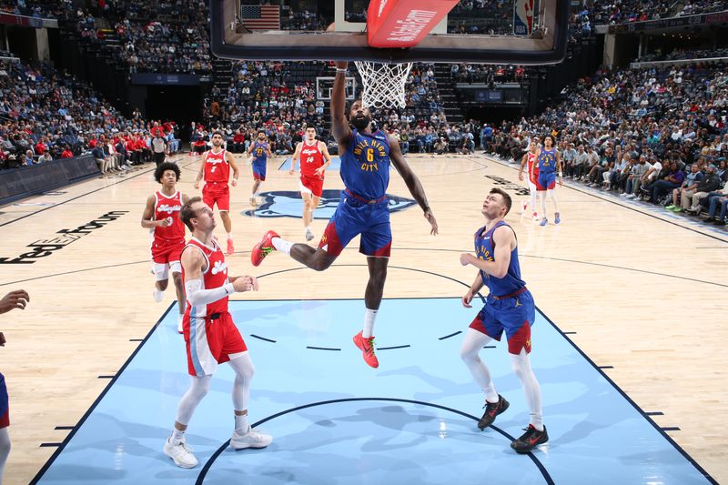 MEMPHIS, TN - NOVEMBER 17: DeAndre Jordan #6 of the Denver Nuggets shoots the ball during the game against the Memphis Grizzlies on November 17, 2024 at FedExForum in Memphis, Tennessee. NOTE TO USER: User expressly acknowledges and agrees that, by downloading and or using this photograph, User is consenting to the terms and conditions of the Getty Images License Agreement. Mandatory Copyright Notice: Copyright 2024 NBAE (Photo by Joe Murphy/NBAE via Getty Images)