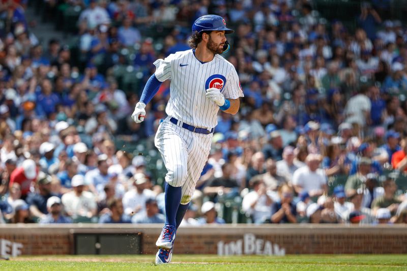 May 5, 2023; Chicago, Illinois, USA; Chicago Cubs shortstop Dansby Swanson (7) watches his single against the Miami Marlins during the fifth inning at Wrigley Field. Mandatory Credit: Kamil Krzaczynski-USA TODAY Sports