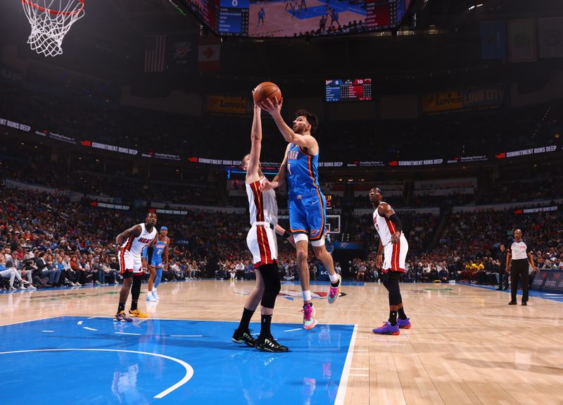 OKLAHOMA CITY, OK - MARCH 8:  Chet Holmgren #7 of the Oklahoma City Thunder drives to the basket during the game against the Miami Heat on March 8, 2024 at Paycom Arena in Oklahoma City, Oklahoma. NOTE TO USER: User expressly acknowledges and agrees that, by downloading and or using this photograph, User is consenting to the terms and conditions of the Getty Images License Agreement. Mandatory Copyright Notice: Copyright 2024 NBAE (Photo by Zach Beeker/NBAE via Getty Images)